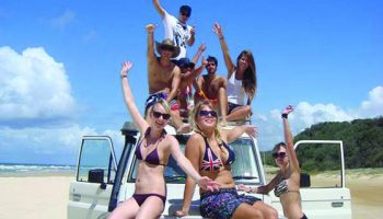 Group of people sitting on 4WD